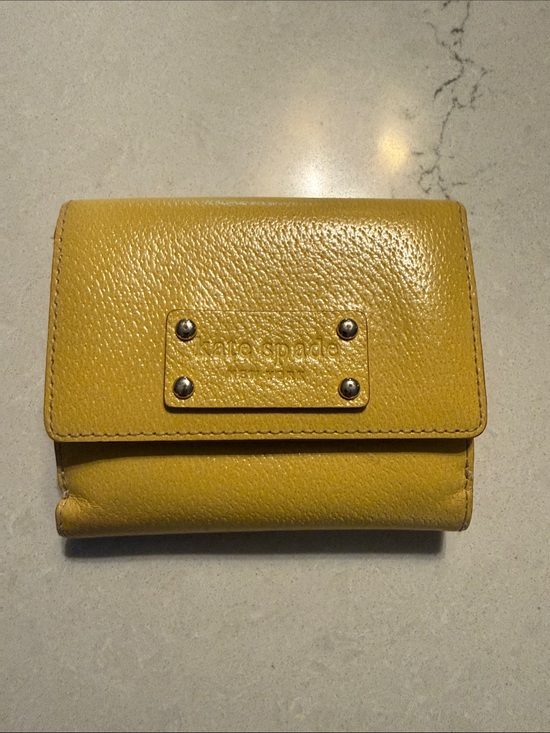 kate spade Handbags - kate spade Mustard Yellow Pebbled Leather Small Wallet with Logo Plate
